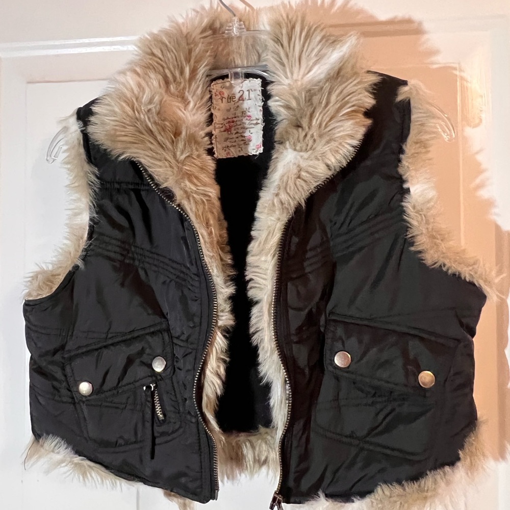 Rue21 girls size L. Black trimmed faux fur vest